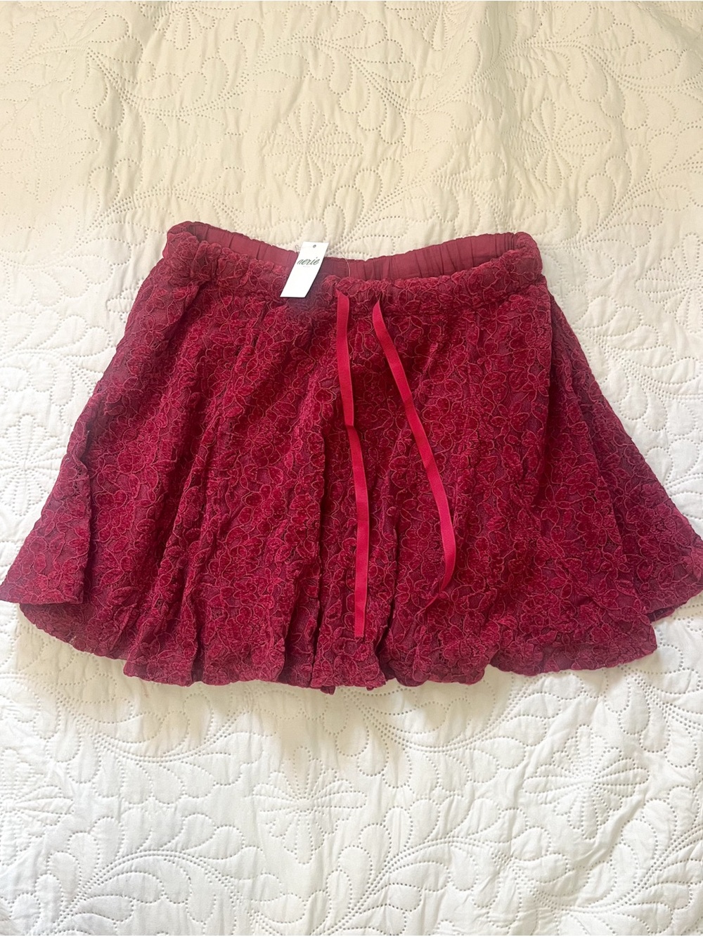NWT Aerie Women's Red Lace Floral Flare Short Skirt Drawstring
Size Xtra Small